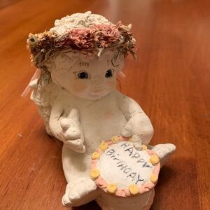 White Ceramic Angel Figurine with Pink and Yellow Cake Accent